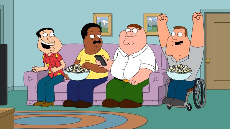 Quagmire, Cleveland, Peter and Joe watching TV