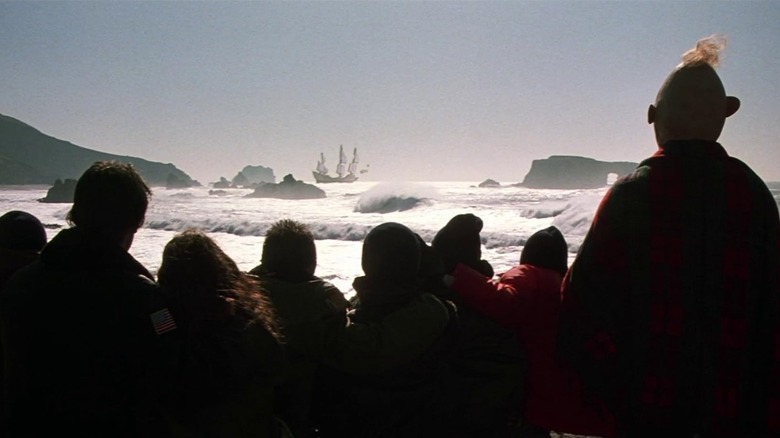 The Goonies watching One-Eyed Willy's ship sail away