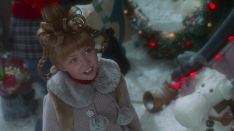 Cindy Lou Who, in full Christmas regalia, looking innocent.