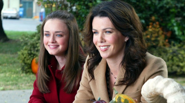 Rory and Lorelai smiling outside