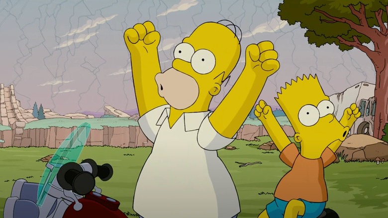 The Simpsons Movie Homer and Bart cheering on motorcycle