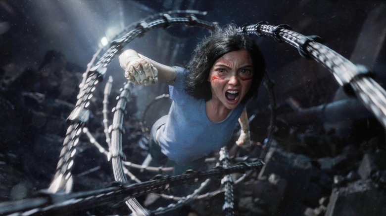 Alita: Battle Angel punching through the air