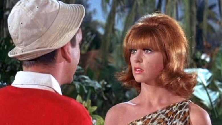 Tina Louise is surprised by Bob Denver as Gilligan on the island of Gilliga