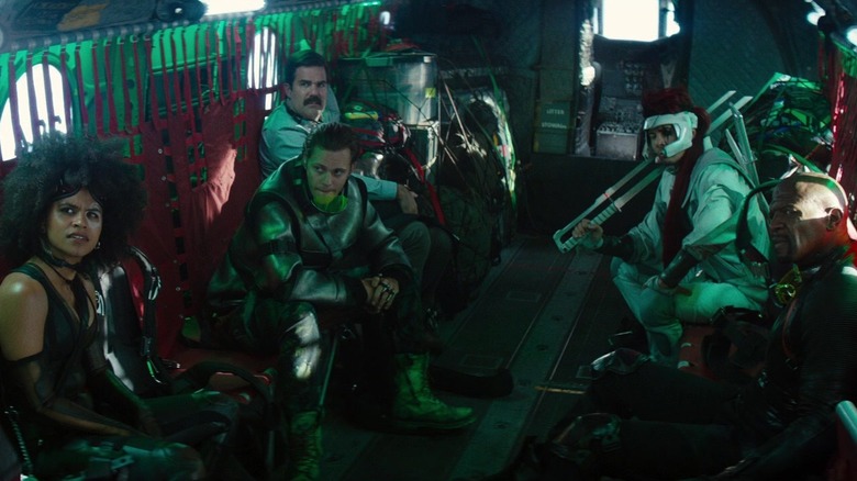 The X-Force sitting together in a cargo plane in Deadpool 2