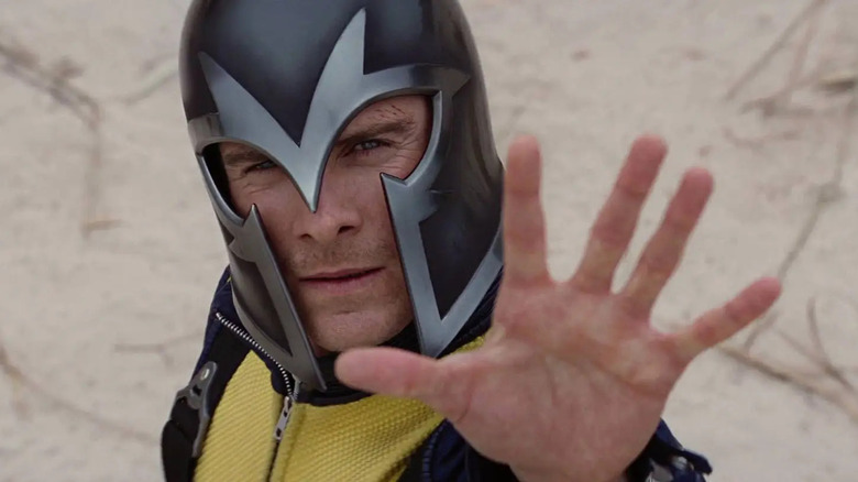 Magneto holding back missiles on a sandy beach in X-Men: First Class
