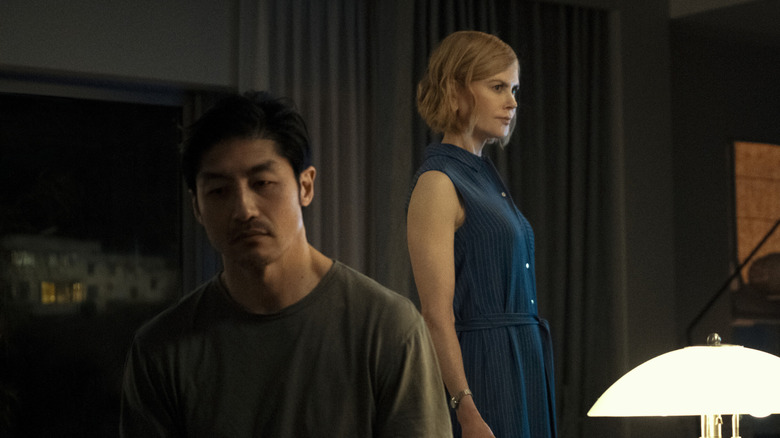 Brian Tee's Clarke Woo and Nicole Kidman's Margaret Woo looking sad on Expats