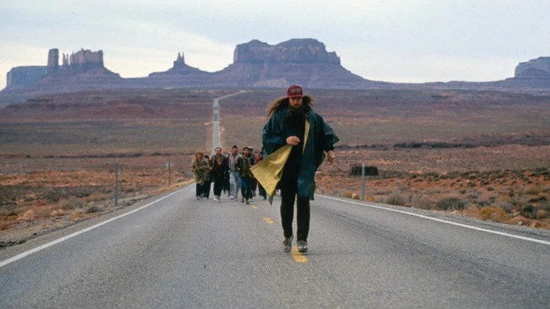 Tom Hanks' Forrest Gump looking thoughtful on Forrest Gump