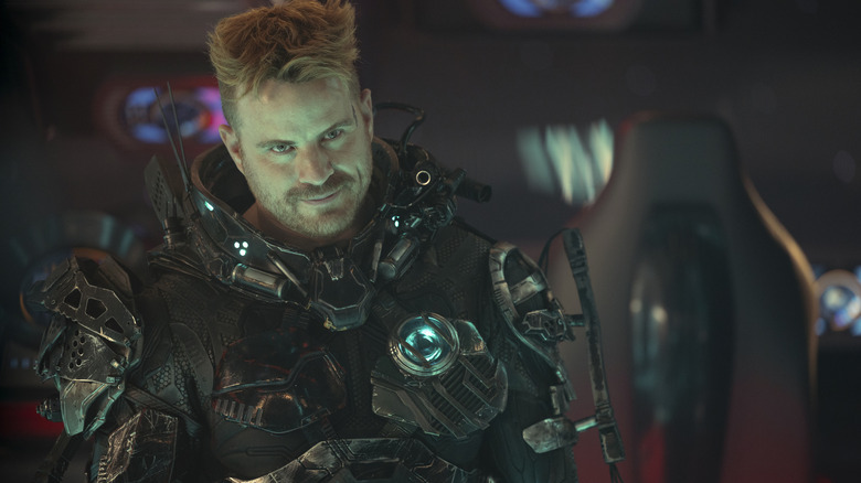 Rob Kazinsky as Zeph wearing his mech suit and a smirk in Star Trek: Section 31