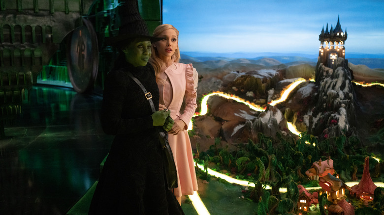 Cynthia Erivo as Elphaba and Ariana Grande as Glinda at the Emerald City in Wicked