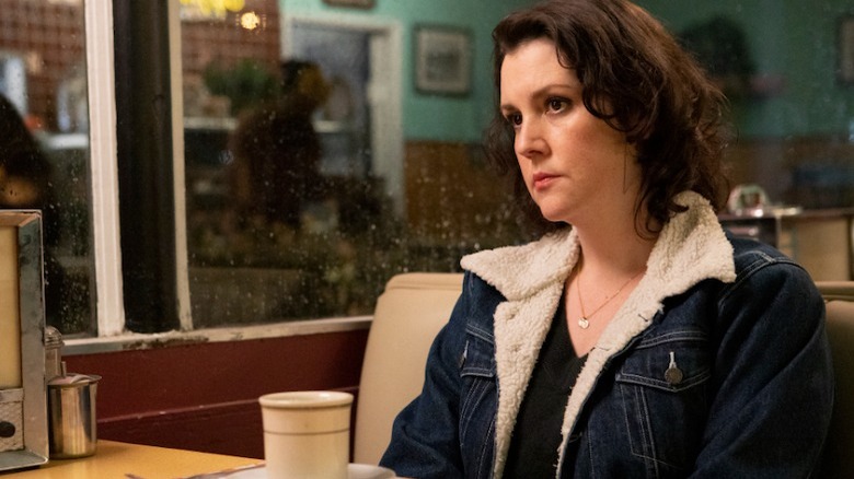 Melanie Lynskey at diner table