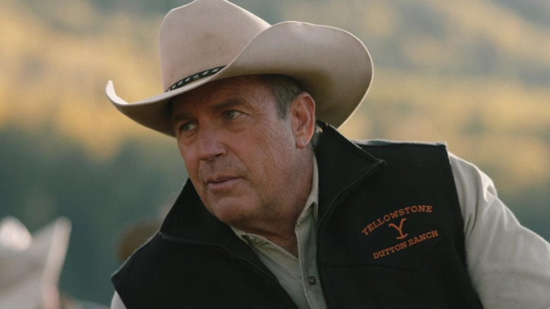 Kevin Costner's John Dutton III hunched over on Yellowstone