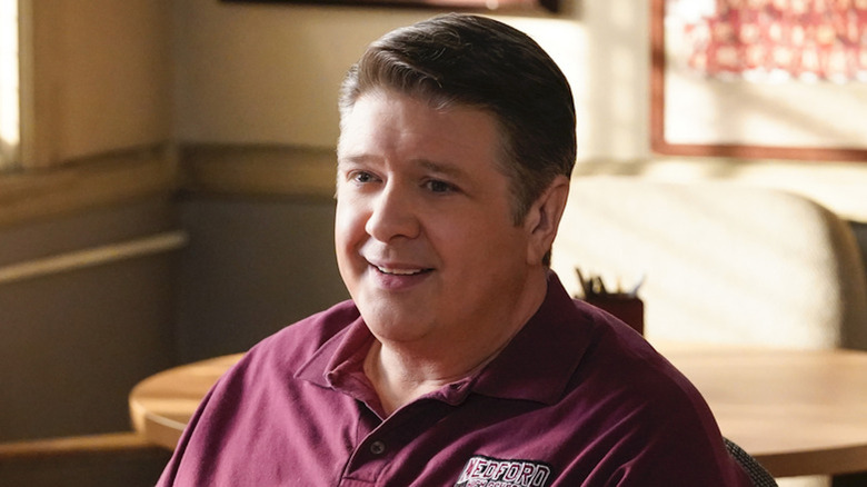 Lance Barber coaches 'em up as George Cooper in Young Sheldon