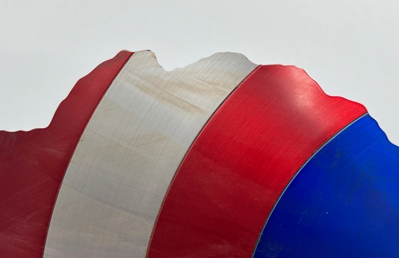 Scruff marks on battle-damaged Captain America shield from Avengers: Endgame